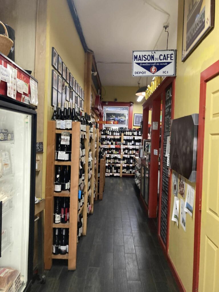 The shop aisle in San Francisco Wine and Cheese.